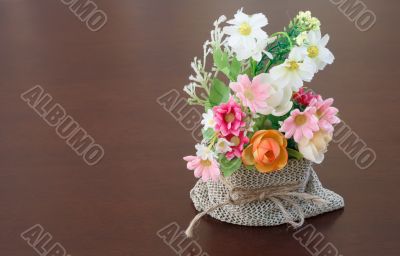 Decorative flower on wooden desk