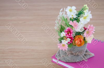 Decorative flower on wooden desk