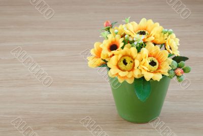 Decorative flower on wooden desk