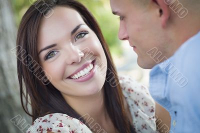 Mixed Race Romantic Couple Portrait in the Park