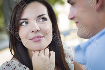 Mixed Race Romantic Couple Portrait in the Park