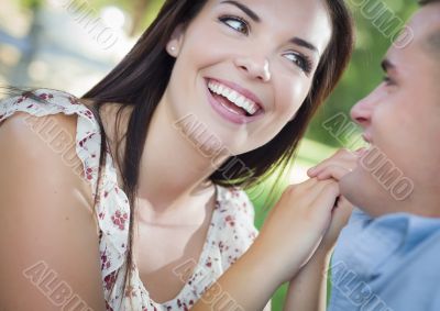 Mixed Race Romantic Couple Portrait in the Park