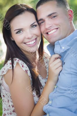Mixed Race Romantic Couple Portrait in the Park
