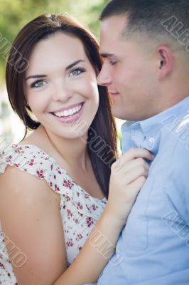 Mixed Race Romantic Couple Portrait in the Park