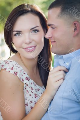 Mixed Race Romantic Couple Portrait in the Park