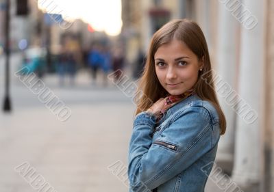 portrait of a beautiful girl in a jeans jacket
