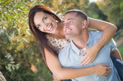 Mixed Race Romantic Couple Portrait in the Park