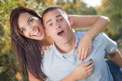 Mixed Race Romantic Couple Portrait in the Park