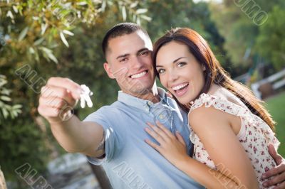 Happy Excited Couple with New House Keys