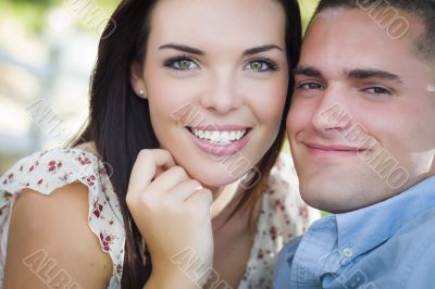 Mixed Race Romantic Couple Portrait in the Park