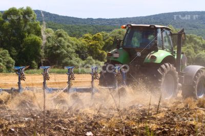 Tractor working on the field