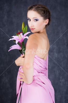 girl with a pink flower