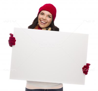 Excited Girl Wearing Winter Hat and Gloves Holds Blank Sign 
