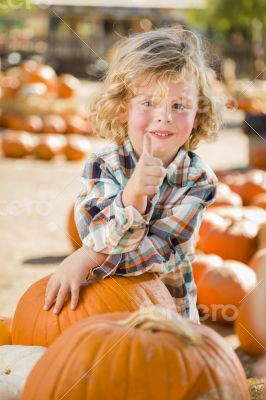 Little Boy Gives Thumbs Up  at Pumpkin Patch