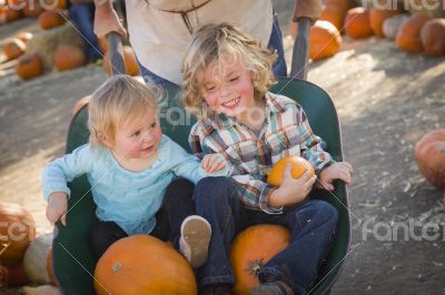 Young Family Enjoys a Day at the Pumpkin Patch