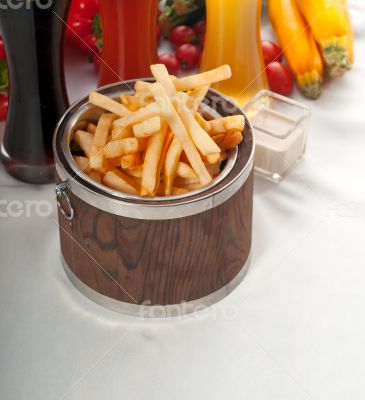 fresh french fries on a bucket