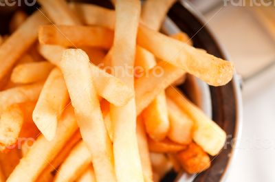 fresh french fries on a bucket