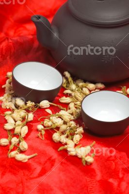 jasmine tea over red silk