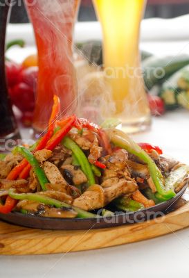 original fajita sizzling hot  on iron plate