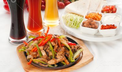 original fajita sizzling hot  on iron plate