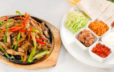 original fajita sizzling hot  on iron plate