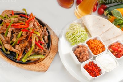 original fajita sizzling hot  on iron plate