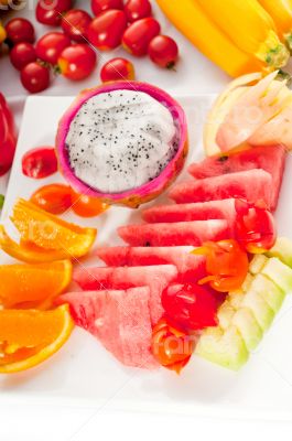 mixed plate of fresh sliced fruits