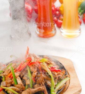 original fajita sizzling hot  on iron plate
