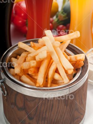fresh french fries on a bucket