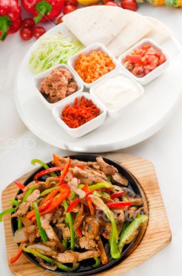 original fajita sizzling hot  on iron plate