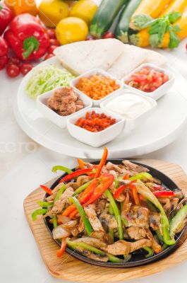 original fajita sizzling hot  on iron plate