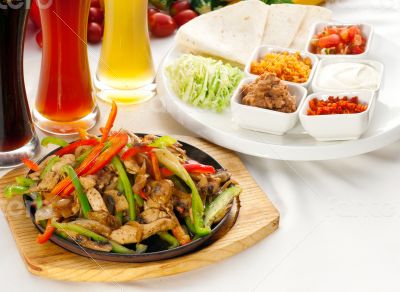 original fajita sizzling hot  on iron plate