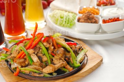 original fajita sizzling hot  on iron plate