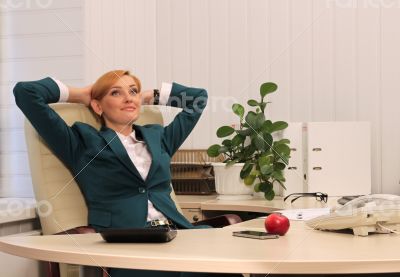 Beautiful Businesswoman in Her Study Dreaming