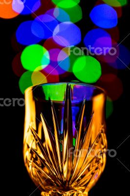 Light bubbles coming out of a wine glass
