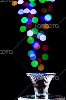 Light bubbles coming out of a glass