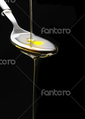 olive oil on a spoon