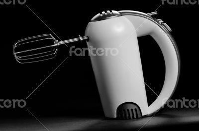 electric mixer isolated on black