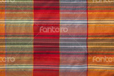 Multicoloured fabric with geometric pattern