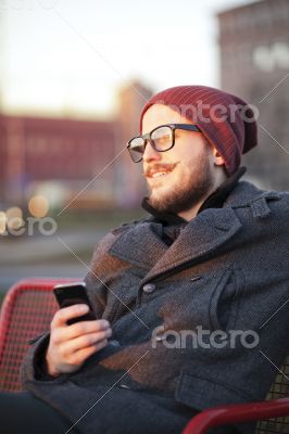Young man with smartphone