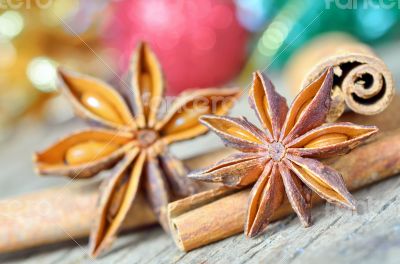 extremely closeup view of anise star and cinnamon sticks
