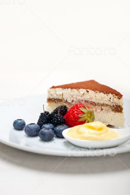 tiramisu dessert with berries and cream