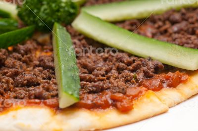 Turkish beef pizza with cucumber on top