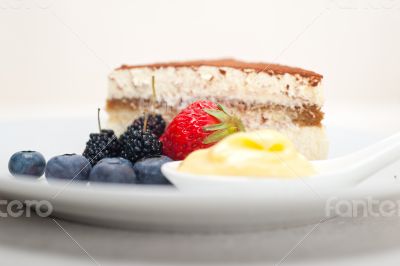 tiramisu dessert with berries and cream
