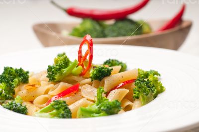 Italian penne pasta with broccoli and chili pepper