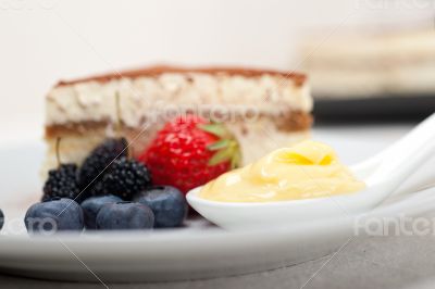 tiramisu dessert with berries and cream