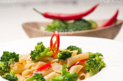Italian penne pasta with broccoli and chili pepper