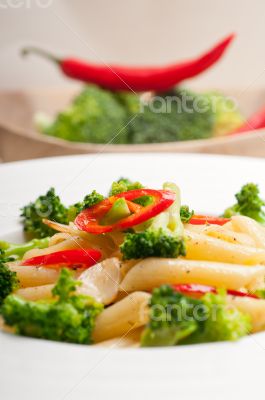 Italian penne pasta with broccoli and chili pepper