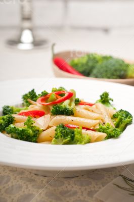 Italian penne pasta with broccoli and chili pepper
