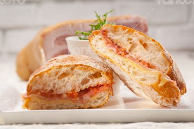 ciabatta panini sandwich with parma ham and tomato